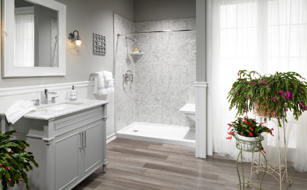 Barrier-free shower with grab bars and fold-down seat